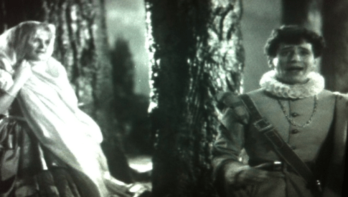 Jean Muir as Helena and Ross Alexander as Demetrius.